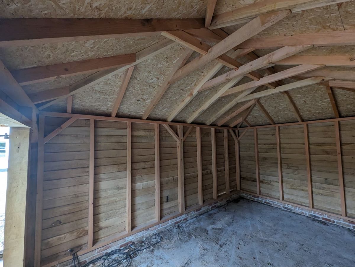 Interior view showing exposed timber frame and roof structure